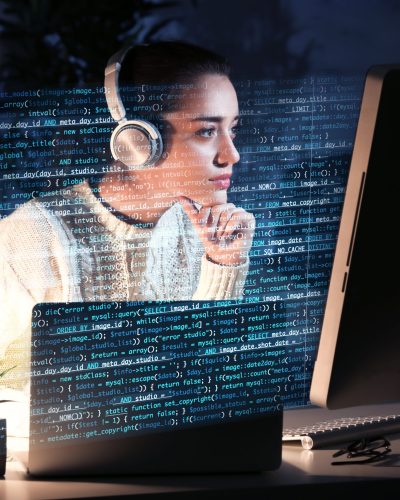 Young woman working with computer at table. Concept of cyber attack